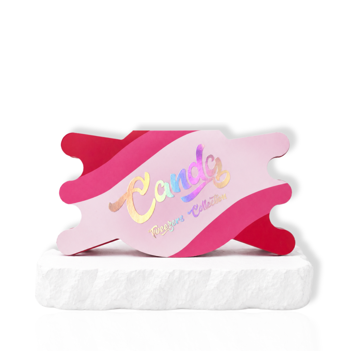 Candy Charm Collection packaging with pink lash tweezers displayed on a white stone surface.