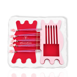 Candy Charm Collection tweezer kit arranged inside a pink candy-shaped case with multiple lash tweezers.