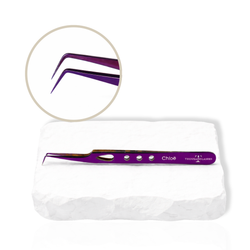 Chloe purple lash tweezer with curved tip displayed on a white stone background