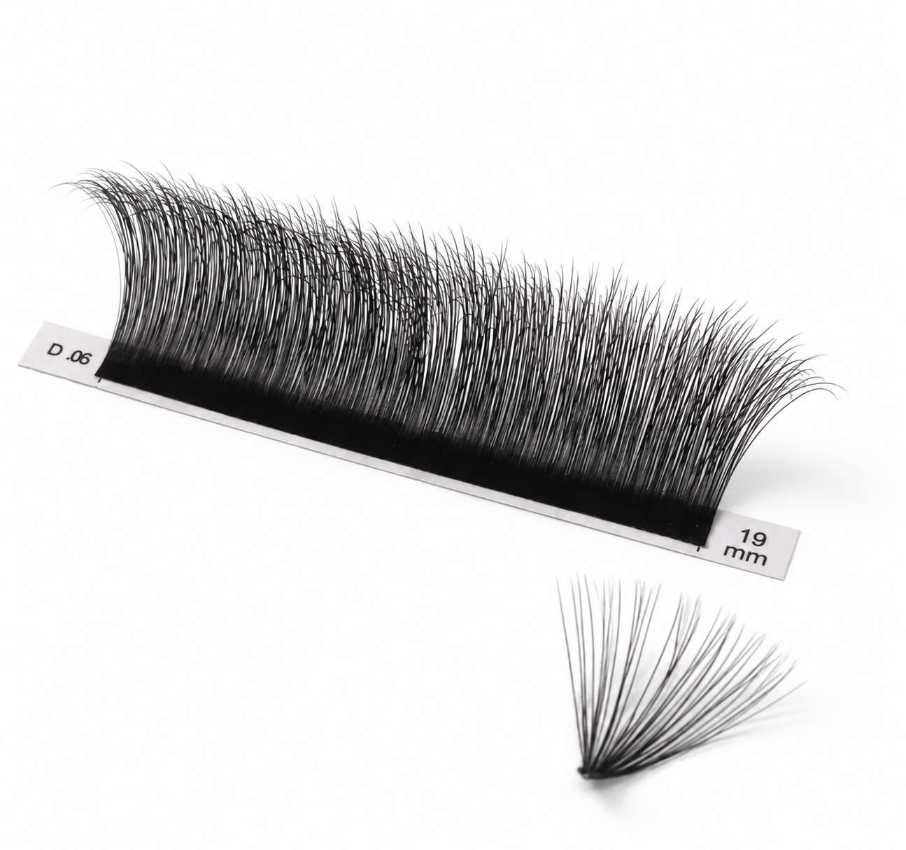 Close-up of 0.05 Volume Lash Extensions showing loose base fibers for easy volume fan creation by lash artists
