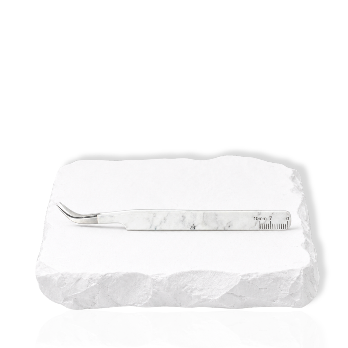 Dolphin lash tweezer close-up showing the curved tip and slim handle design