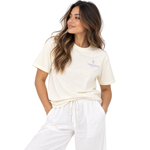 Front view of a model wearing a white Thousand Lashes lash artist t-shirt with a small logo design on the chest.