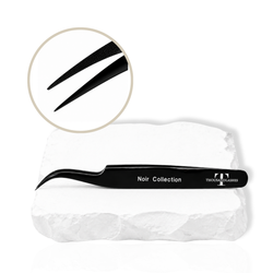 Noir Collection black lash tweezer displayed on a white stone surface with close-up of fine tweezer tips.