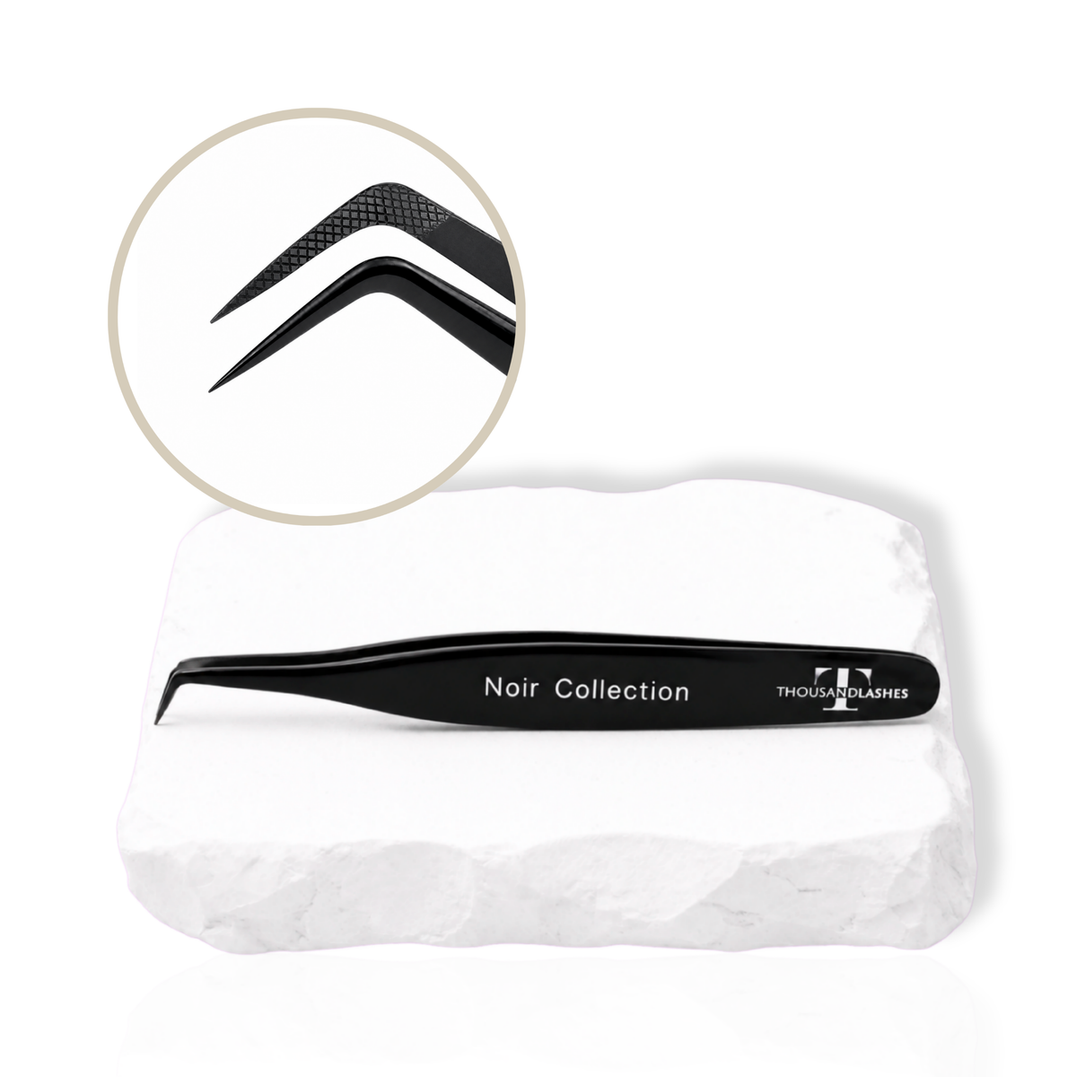 Noir Collection black lash tweezer displayed on a white stone surface with close-up of the precision tip.