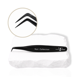 Noir Collection black lash tweezer displayed on a white stone surface with close-up of the precision tip.