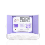 Open Thousand Lashes Korean Lash Lift kit showing lash lift tools, capsules, rods, glue balm, and under eye patches inside a purple case.