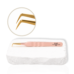 Rose gold 90-degree lash tweezer with angled gold tip for precise eyelash extension application.