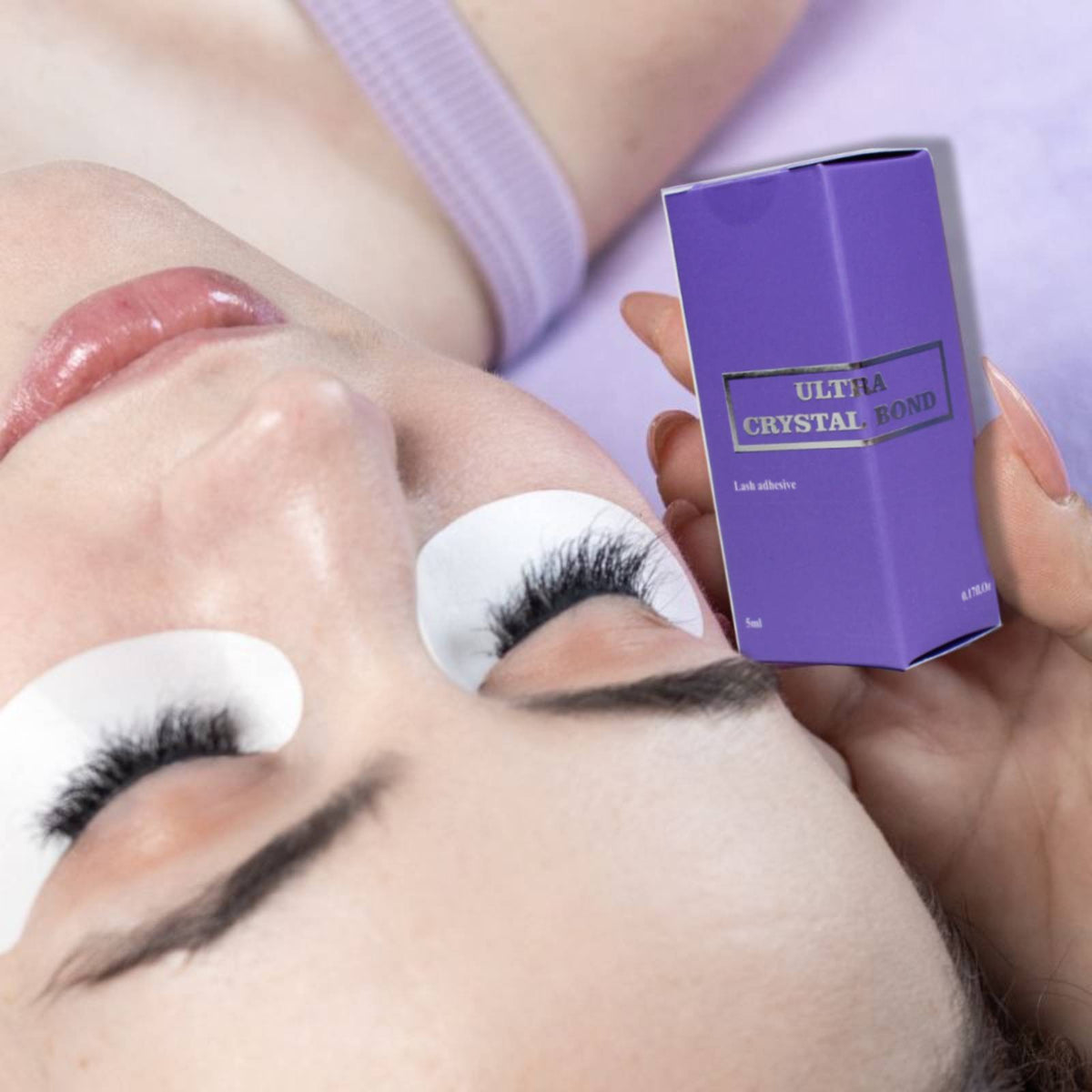 ThousandLashes Ultra Crystal Bond lash adhesive used during professional eyelash extension treatment for long lasting retention