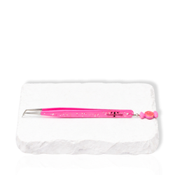 Thousandlashes Candy Charm 45-degree isolation tweezer with pink glitter handle and candy charm on a white stone surface.