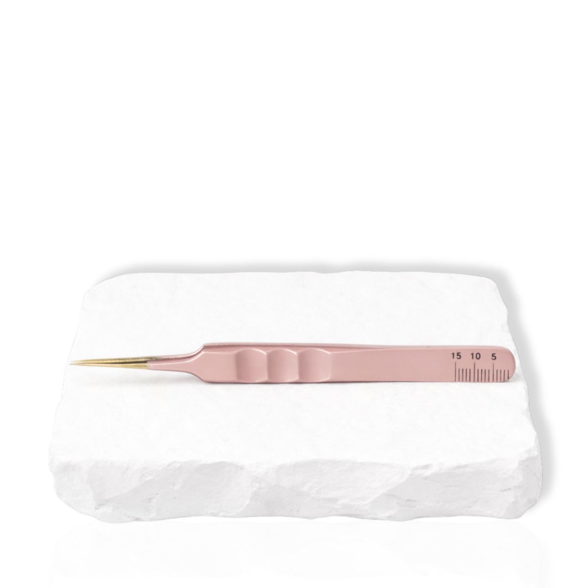 Thousandlashes nude straight isolation lash tweezer on a white stone surface.