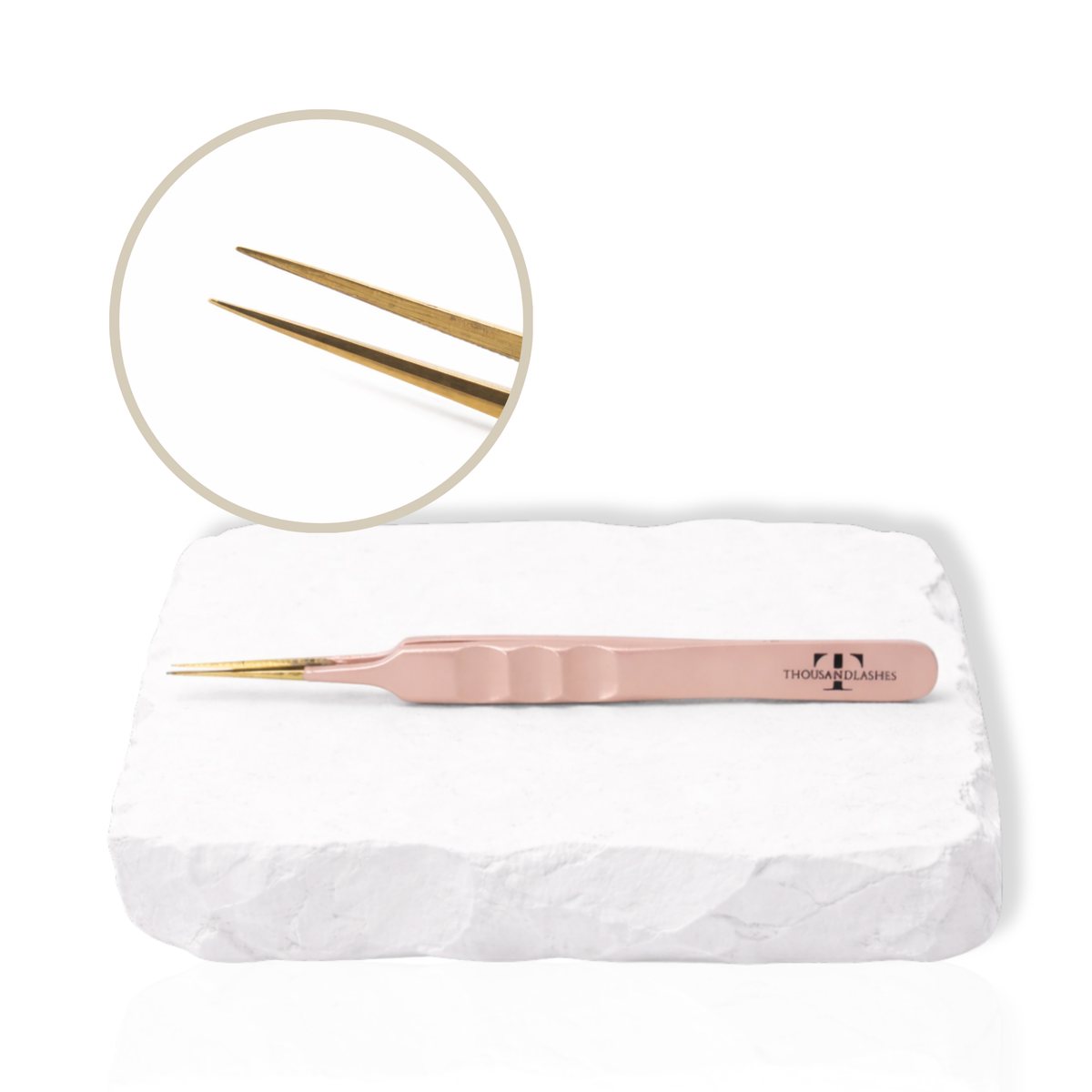 Thousandlashes nude straight isolation lash tweezer with close-up view of the gold tips.