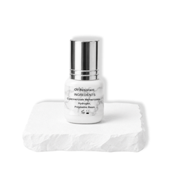 Ultra Crystal Clear Bond lash adhesive bottle showing ingredients, oil resistant formula, and professional lash glue packaging