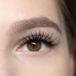 Wet Volume Lash extensions applied on eye creating a wispy wet lash look with defined spikes